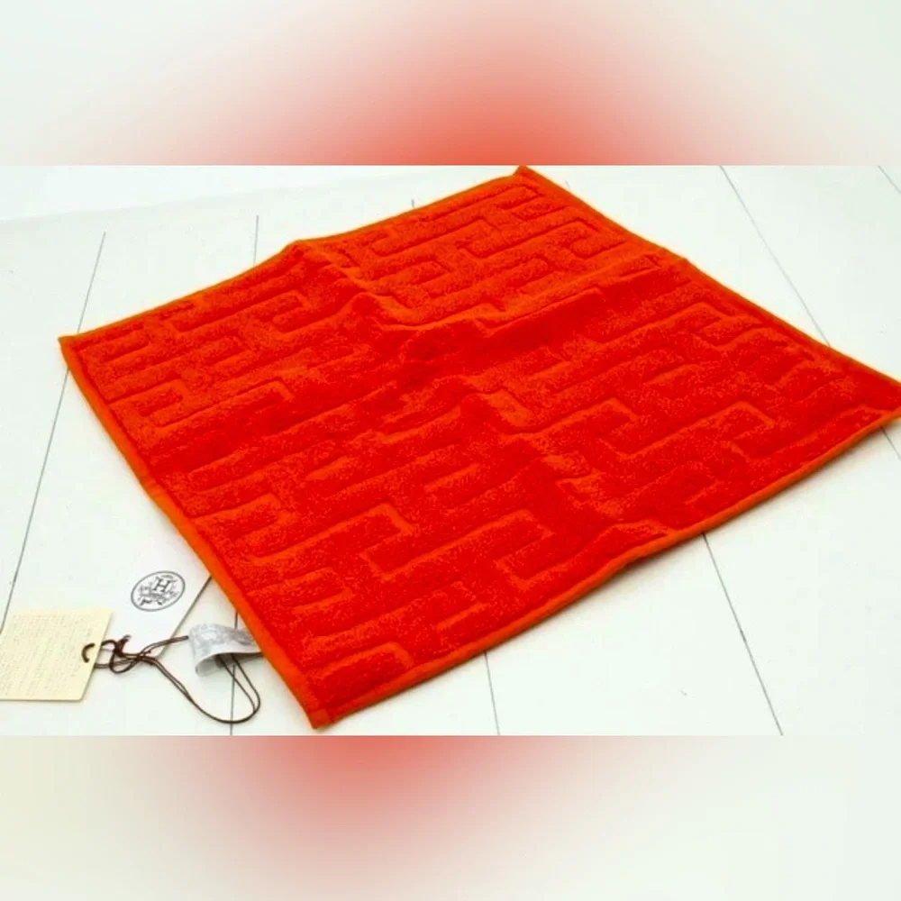 . HERMES ORANGE CARRE STAIRS HAND TOWEL NWT
